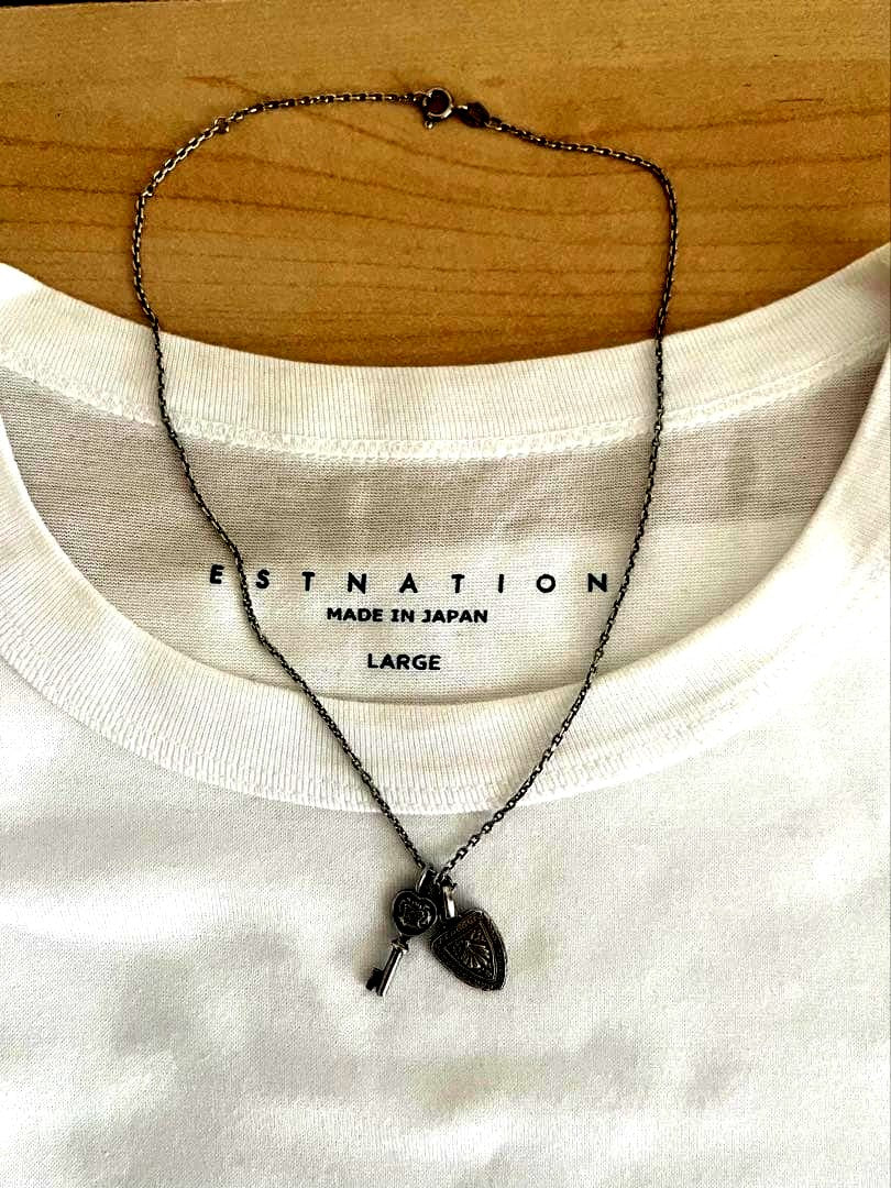Agete silver necklace with key and emblem charms, 400mm length, slight blackening finish