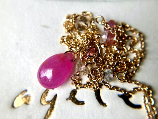 Agete Law pink and purple color stone pendant on a 38cm gold K10 necklace