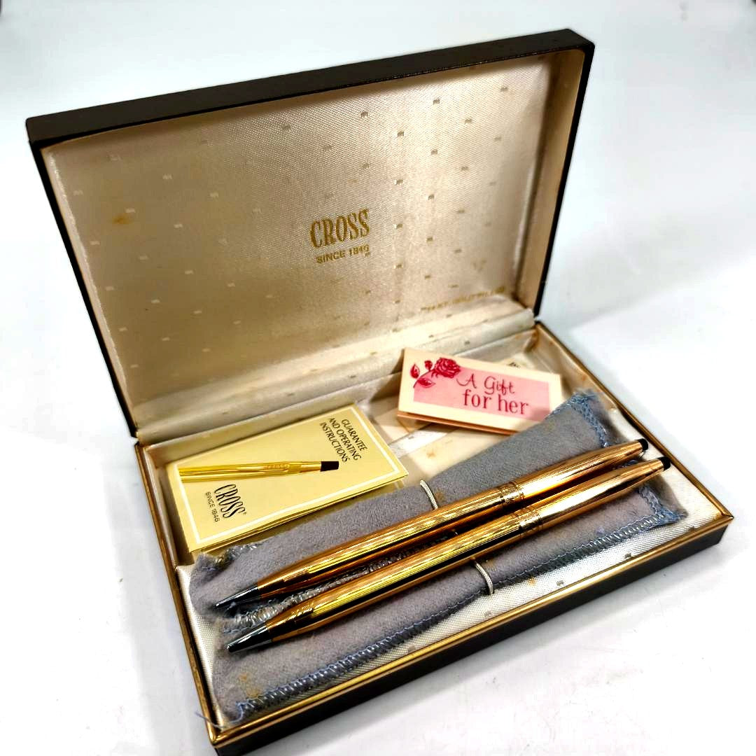 Cross Classic Century gold ballpoint pen and pencil set with blue ink, metal clipless design