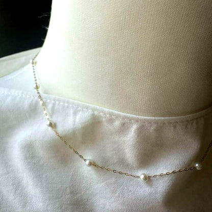 K10YG yellow gold necklace with 17 Akoya pearls ranging 3-6 mm, 45 cm length