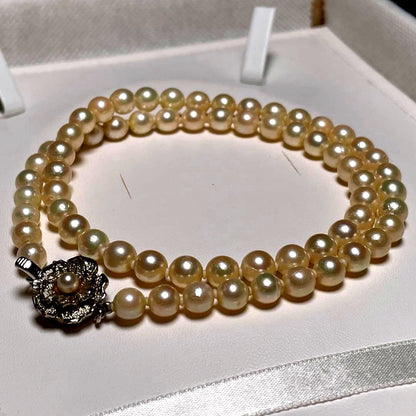 Akoya pearl necklace with round white pearls measuring 5.8-6.4mm on a 46.7cm silver chain