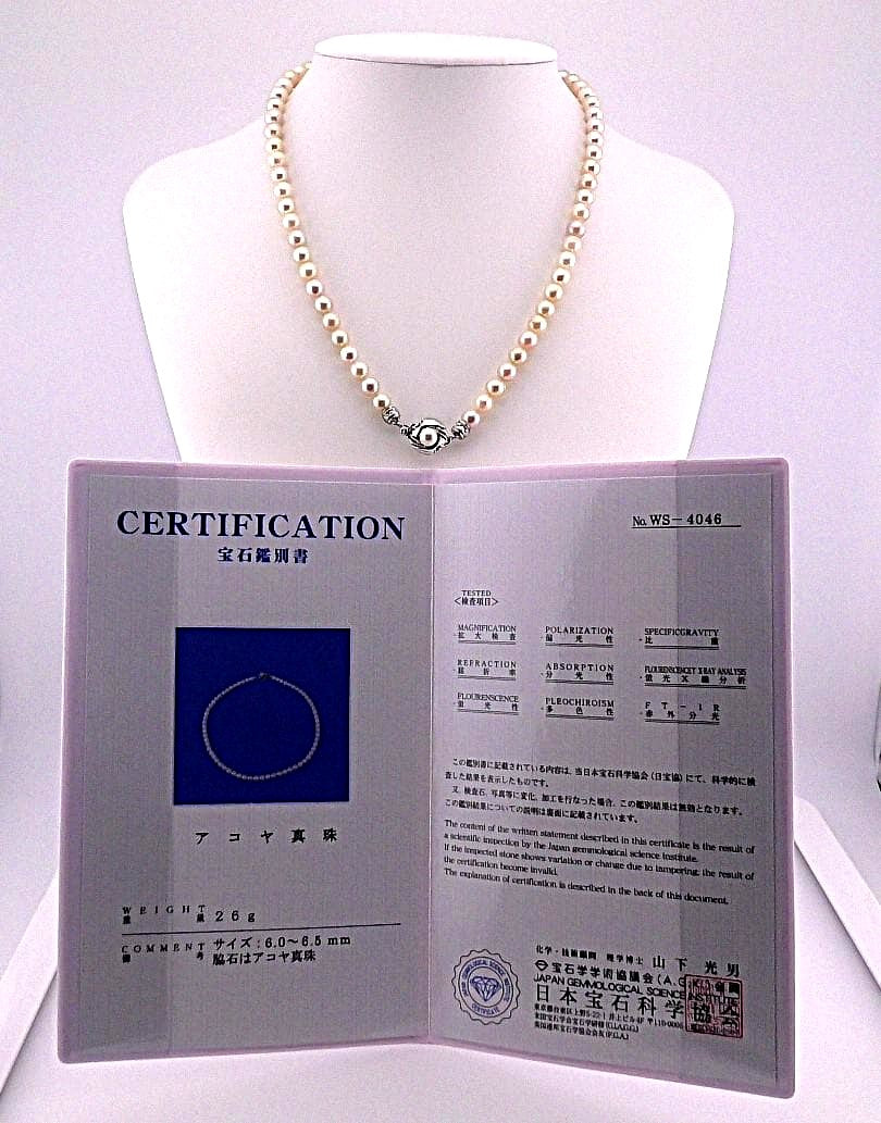 Akoya pearl necklace featuring 6.0 to 6.5mm pearls with silver clasp and safety chain on 45.5 cm strand