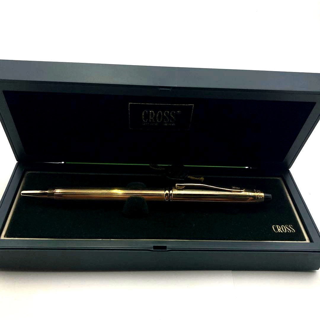 Casio Gold Ballpoint Pen in gold color with minimal signs of use, displayed on a white background