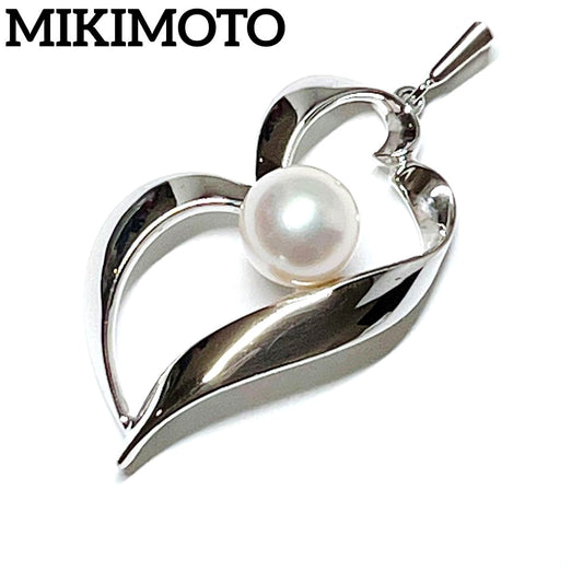 MIKIMOTO genuine pearl necklace featuring 6.7mm pearls on a silver chain weighing 2.3 grams