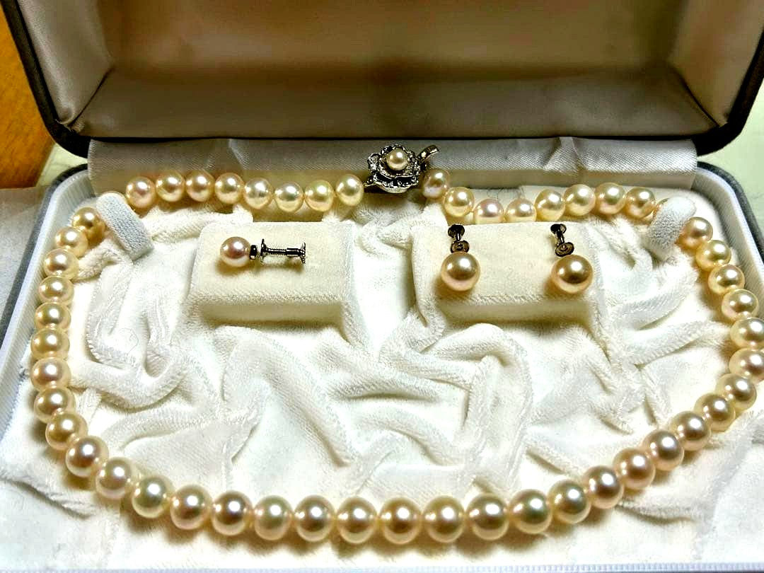 Akoya pearl necklace 8-8.5mm with K14WG earring set and silver single earring displayed on white background