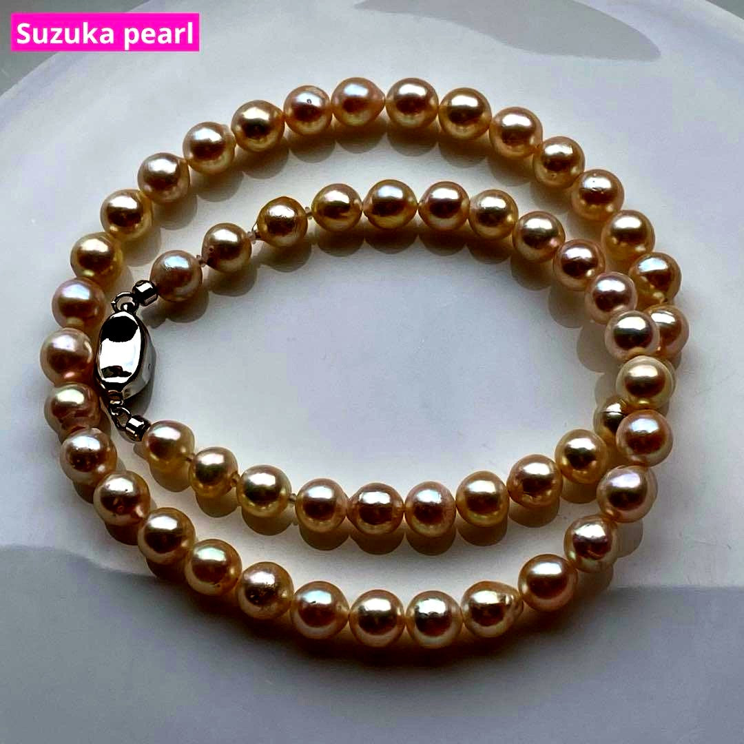 Honolulu Pearl Akoya pearl necklace with 54 toned champagne pearls, 6.8-7.5mm size, 43cm length, silver clasp