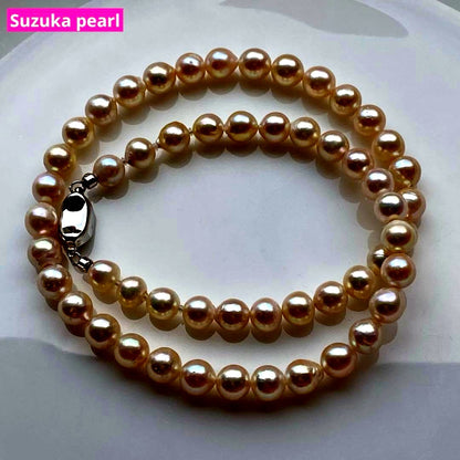 Honolulu Pearl Akoya pearl necklace with 54 toned champagne pearls, 6.8-7.5mm size, 43cm length, silver clasp