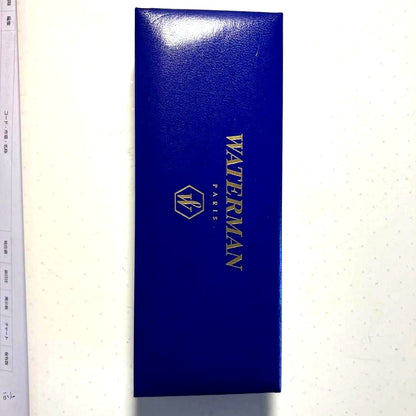 WATERMAN black and gold ballpoint pen with dedicated black case on white background