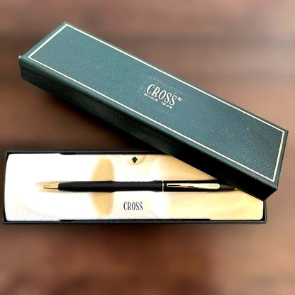 Cross black ballpoint pen shown with its dedicated black presentation box