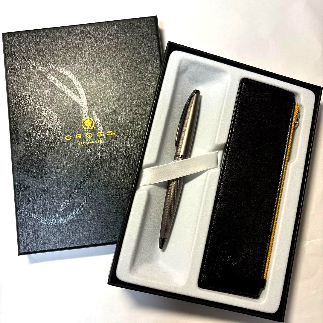 CROSS silver metal ballpoint pen with matching pen case measuring approximately 14 cm