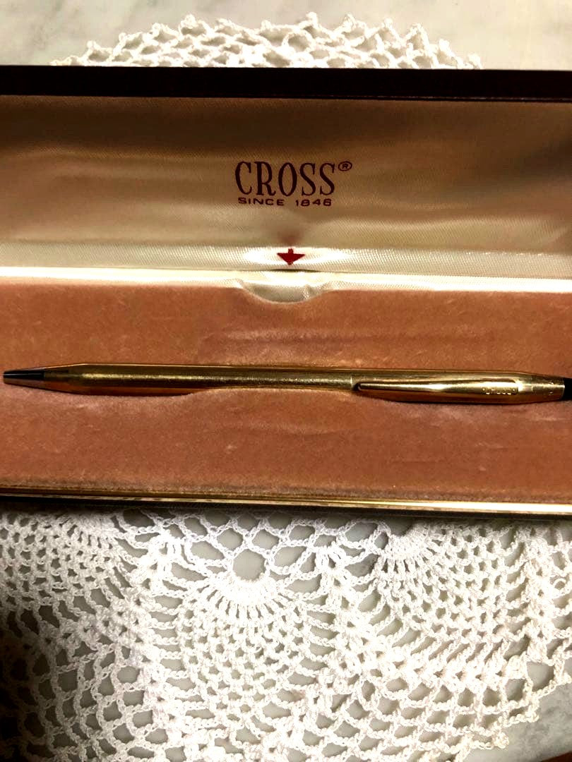 Vintage CROSS ballpoint pen in gold filled with black ink and matching case measuring 13.4 cm