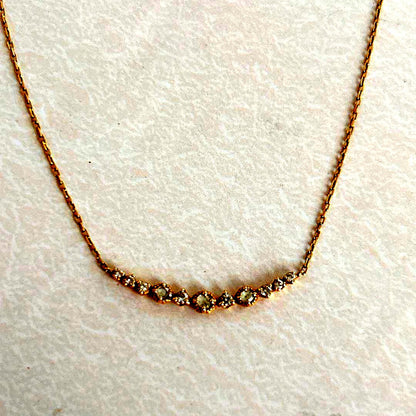 agete K18 gold necklace with 0.09 carat diamonds and 40 cm chain on white background