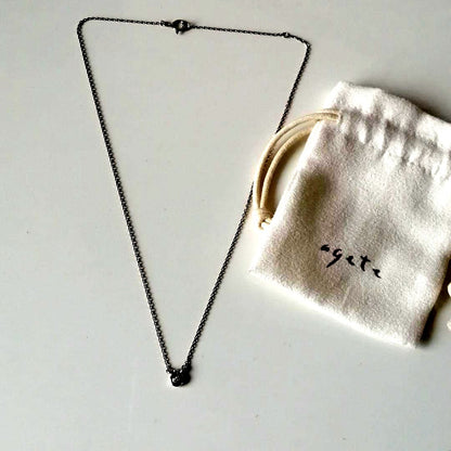 agete necklace with drop motif and transparent stone on a 40 cm chain displayed on white background