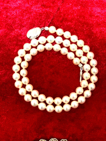Akoya pearl necklace with 57 round 7mm pearls measuring 45cm length in pristine condition