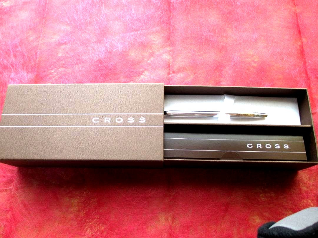 Cross Century Series 3302 ballpoint pen with gold metal body on white background