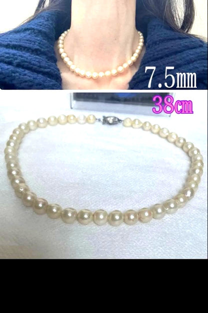 Vintage Akoya pearl necklace with 7.5mm semi-baroque cream-white pearls and silver clasp, 38cm length choker
