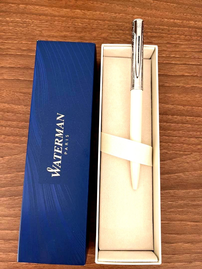 Waterman click ballpoint pen with silver and white design, unused condition