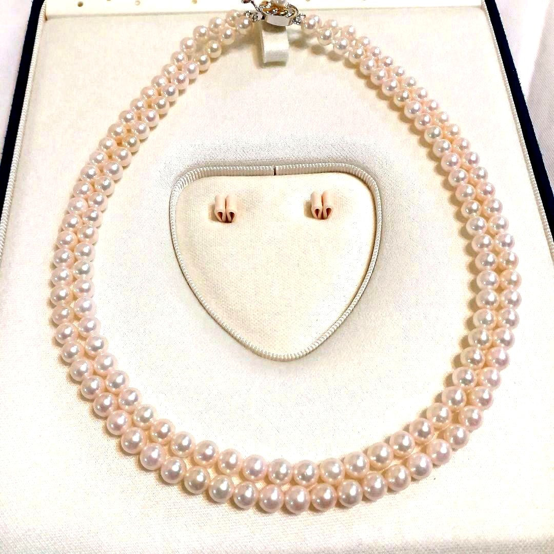 Akoya pearl double strand necklace with round pearls sized 5.5 to 5.8 mm and silver gold clasp