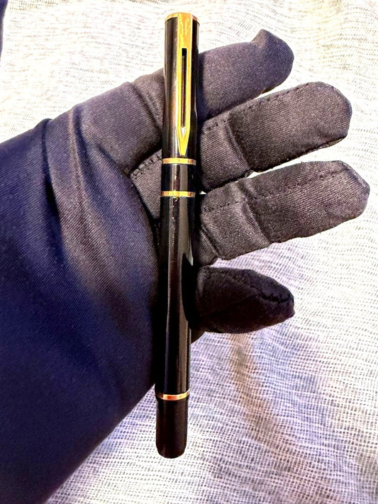 Black Waterman fountain pen with golden decorations and W logo on the cap