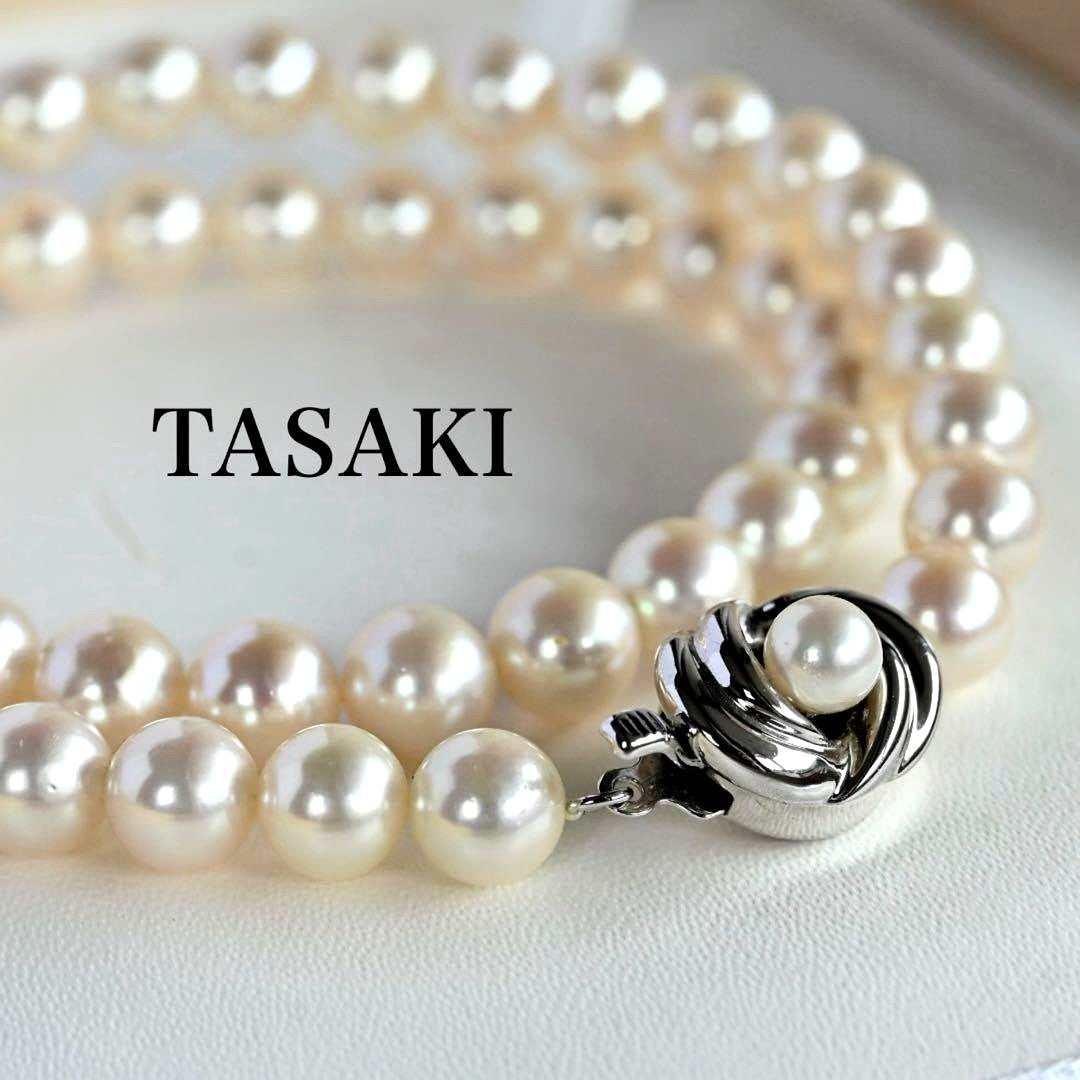 Highest grade Hanadama Tama Saki Akoya pearl necklace with lustrous white pearls on a fine strand