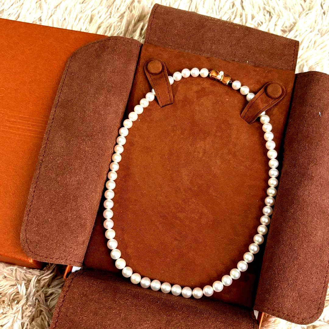 Mikimoto pearl necklace with 6.5-7.0mm pearls on 42 cm K18 gold chain with box and pouch