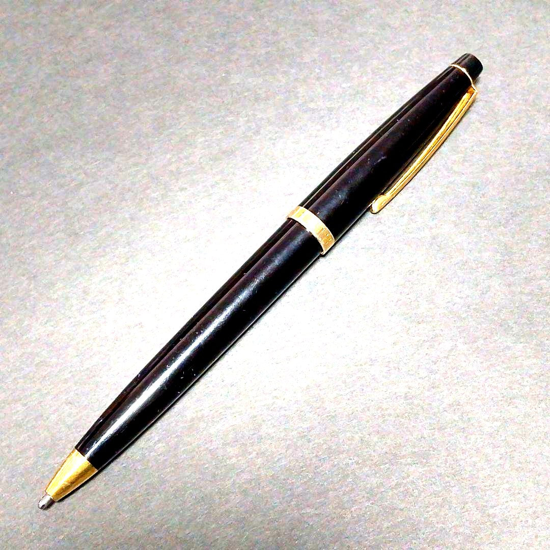 Used Cross Pen Twist Style black and gold refillable body only, approximately 5.5 inches long with minor scratches