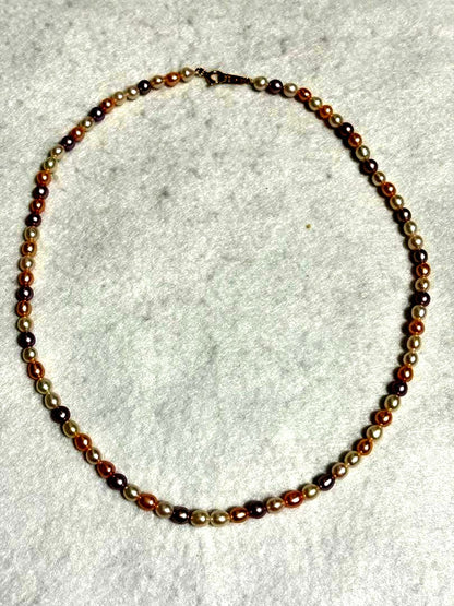 Tasaki K18 freshwater pearl necklace measuring 7.9 inches with elegant white pearls on gold chain