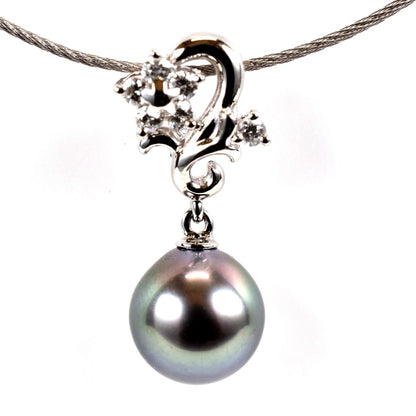 Tasaki necklace with one 9.3mm black pearl and six diamonds on white gold platinum chain