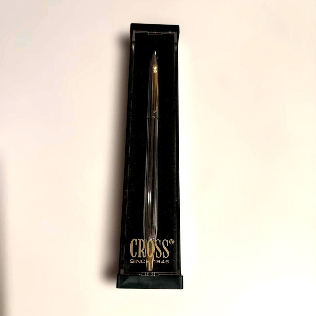 CROSS Classic Century Twist ballpoint pen in silver with gold accents shown with its case