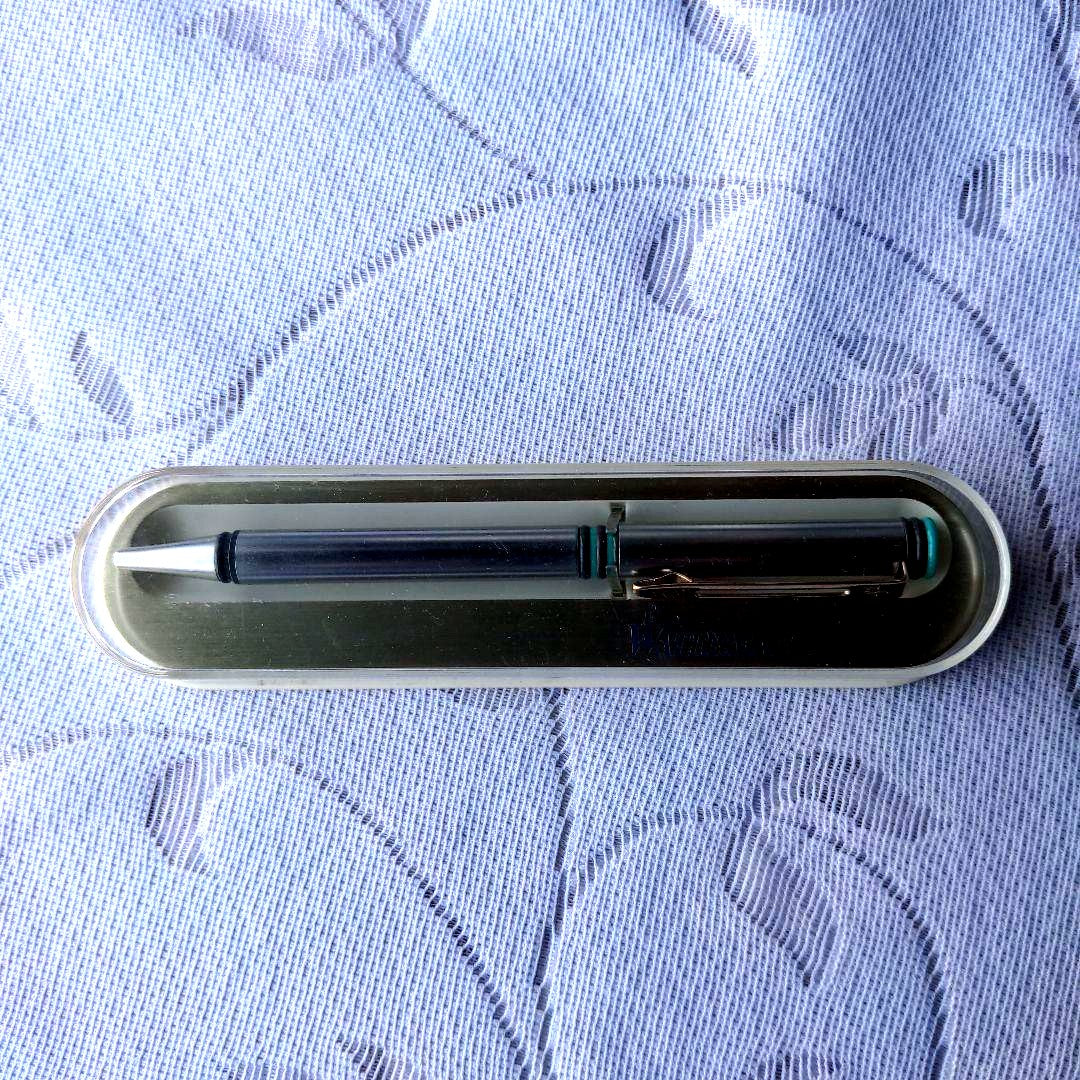 Retro WATERMAN ballpoint pen with 14cm length displayed alongside its vintage case