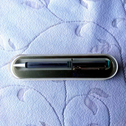 Retro WATERMAN ballpoint pen with 14cm length displayed alongside its vintage case