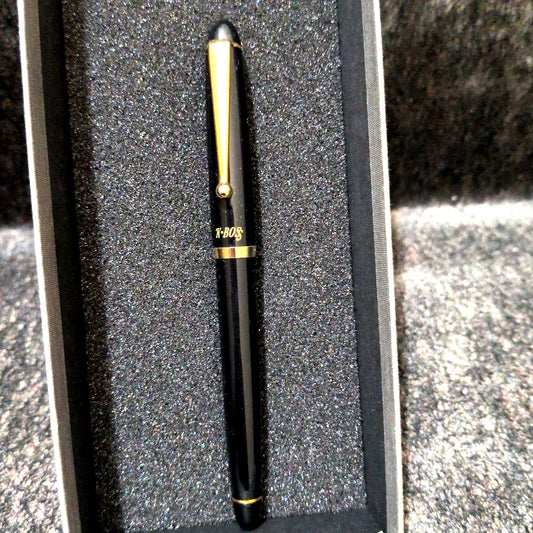 Rare K-BOS Pilot black resin ballpoint pen with gold parts and textured grip, vintage 1980s classic design
