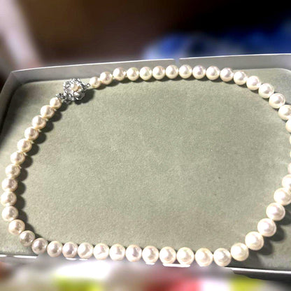 Akoya pearl necklace with 7mm pearls and removable silver clicker clasp in simple elegant design