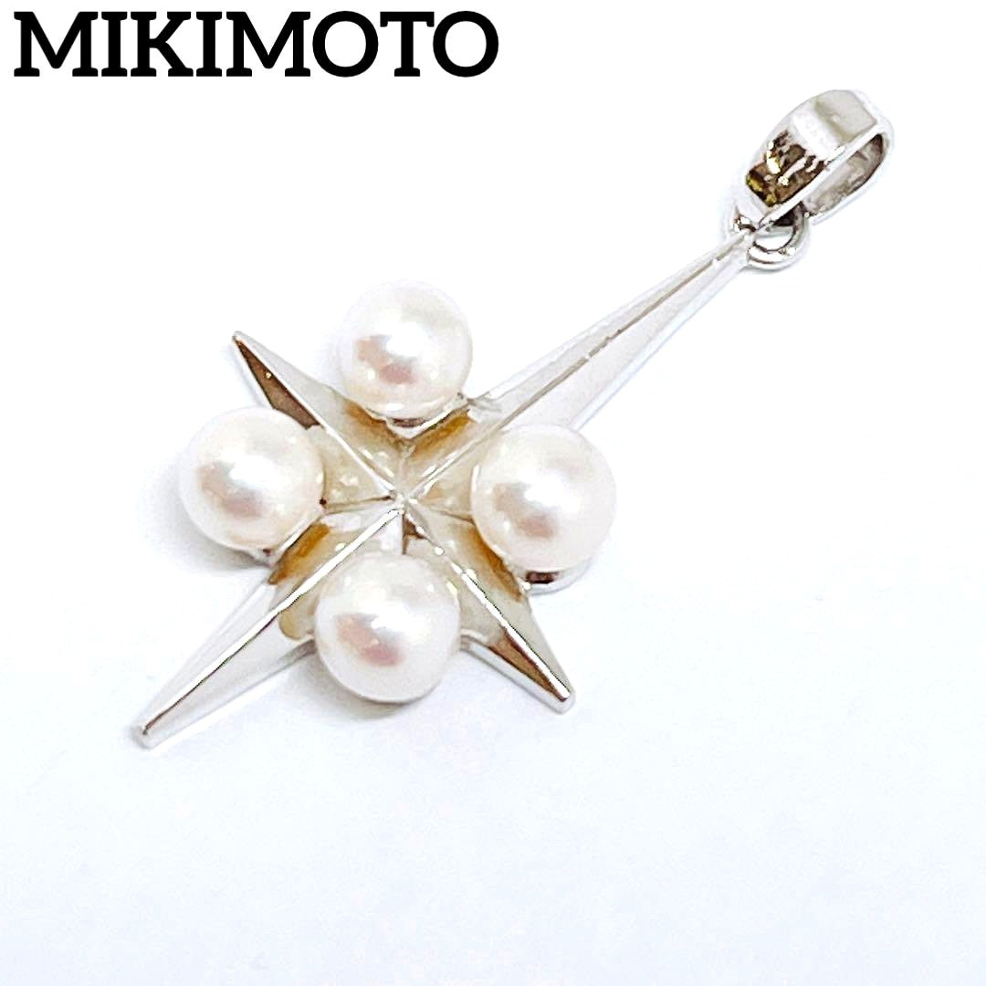 Mikimoto silver pendant necklace with four round pearls and a cross design
