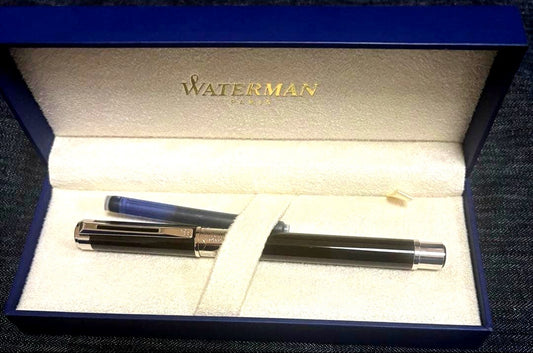 Waterman Perspectiv fountain pen with black body, silver trim, fine nib, and included case and ink cartridges