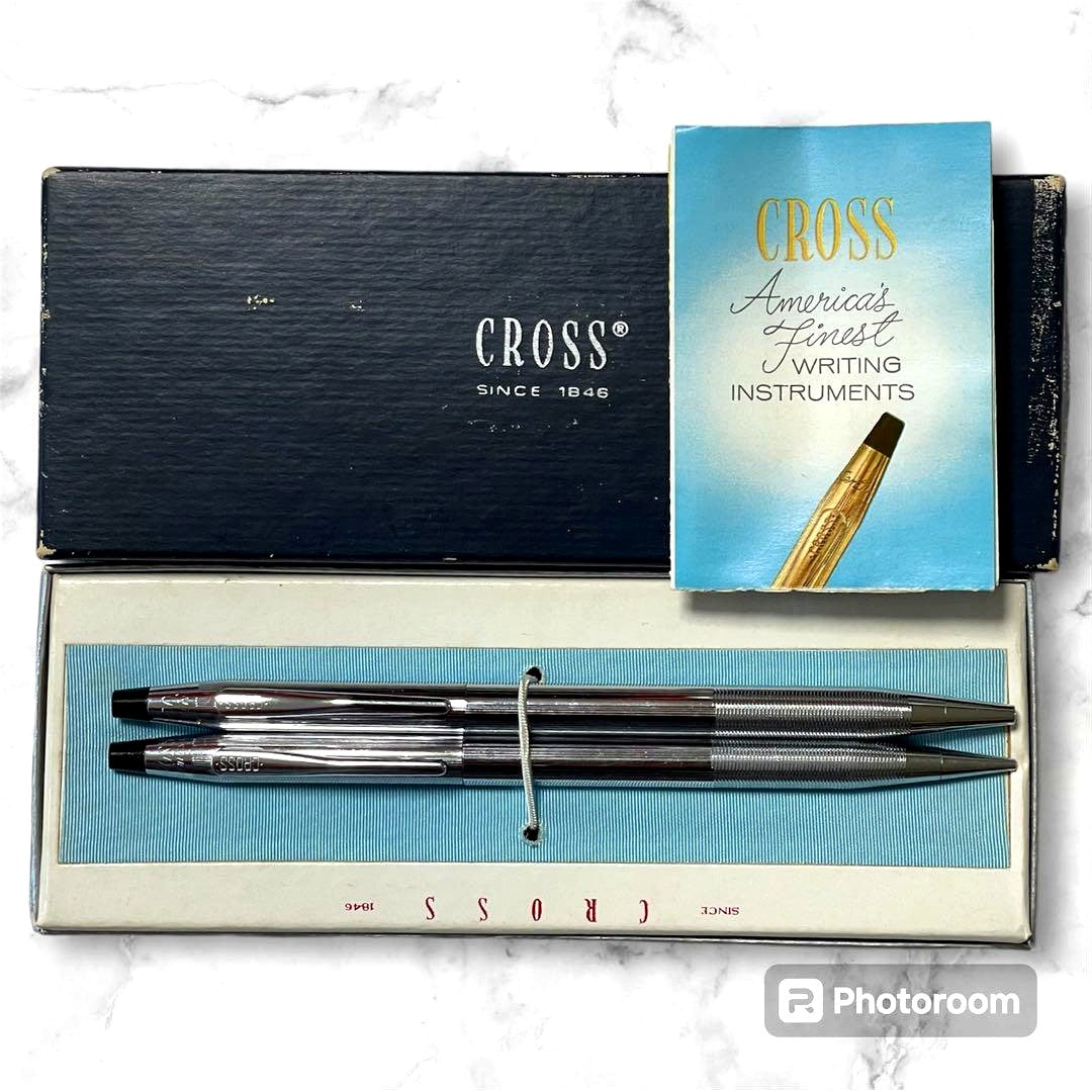 Silver Cross mechanical pencil and ballpoint pen set with rotating mechanism showing slight wear