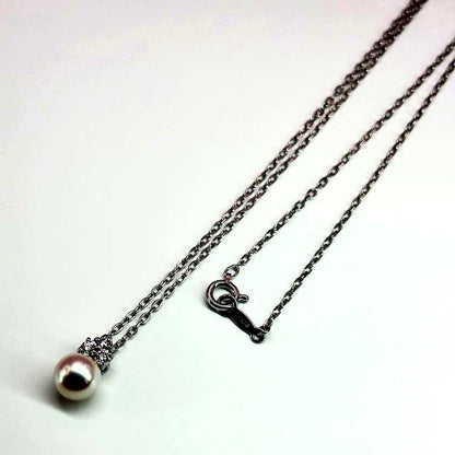 Mikimoto K18WG necklace featuring 6.7mm diamond pearl, 39cm length, displayed on white background