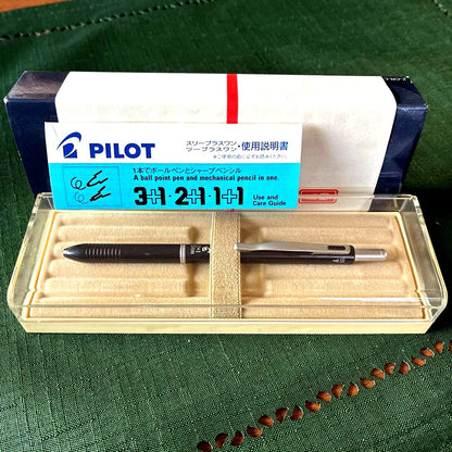 Pilot To plus One mechanical pencil and two-color ballpoint pens with visible storage wear
