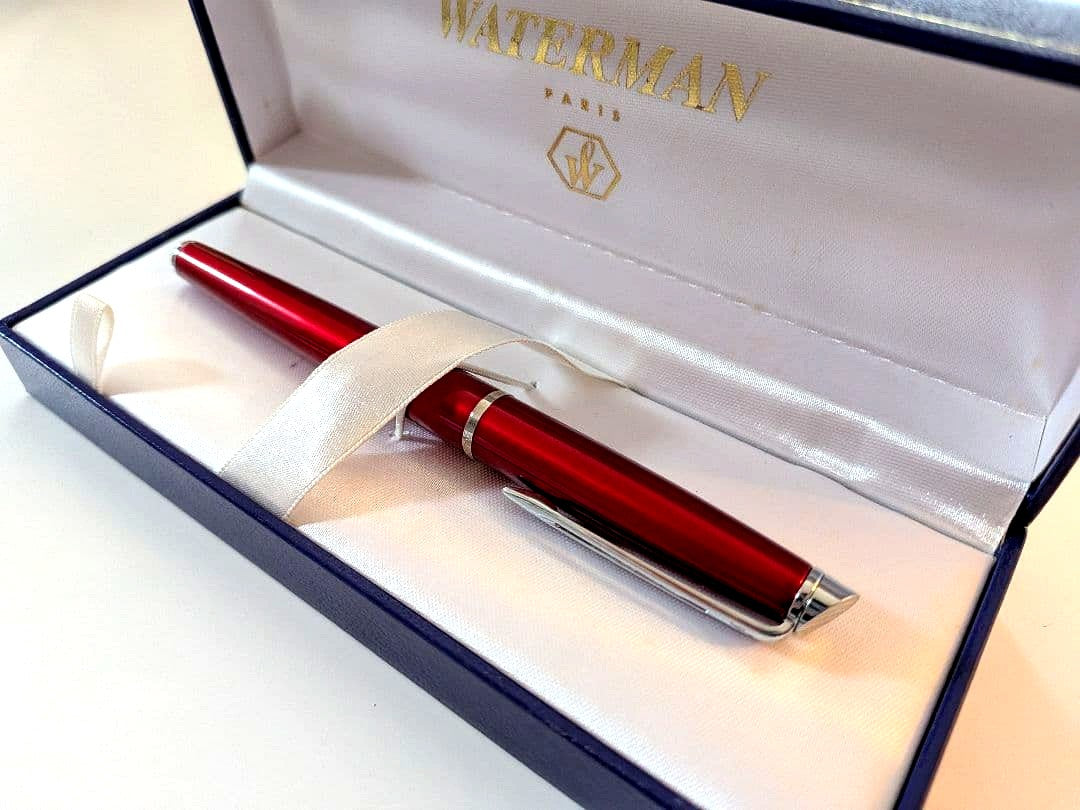 WATERMAN fountain pen with red body, stainless steel nib, and included dedicated case