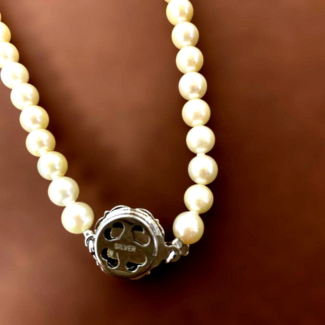 Akoya pearl necklace with approximately 5mm pearls on a 39cm silver chain