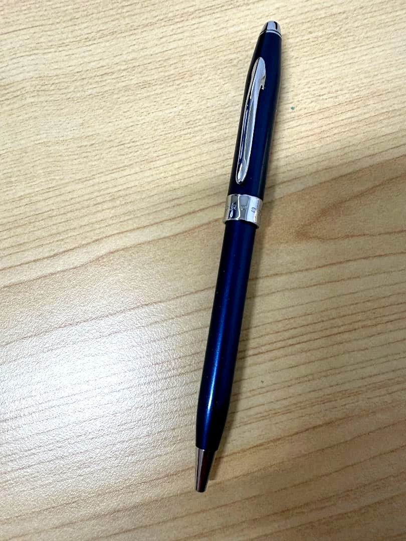 Brand Cross ballpoint pen shown with tested ink and clean condition