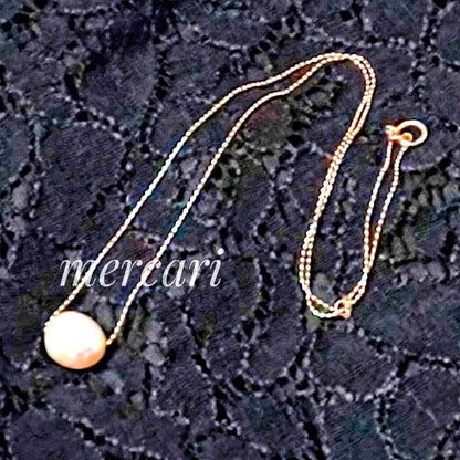 Agete pearl necklace with 10K gold ball chain and plump freshwater pearl featuring natural surface texture