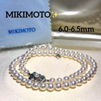 Mikimoto Akoya Pearl M Charm Necklace with 6.5mm pearl pendant and 44cm chain displayed with box