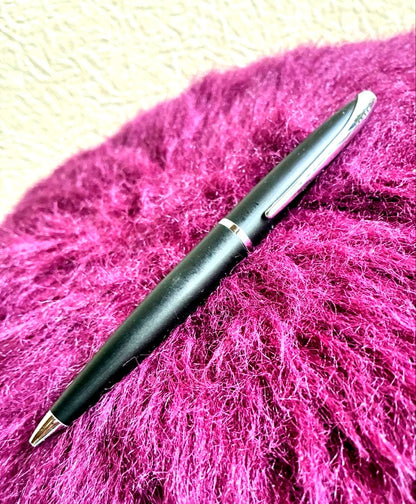 Cross black ballpoint pen with simple, sleek design shown against white background