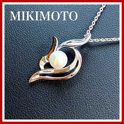 Akoya pearl necklace with a single 6.2mm pearl on a 40cm flowing curve silver chain