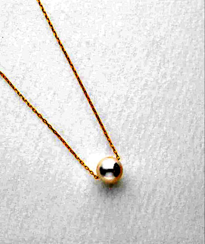 K10 Akoya pearl necklace with 7-8mm pearls set in 10 karat yellow gold chain