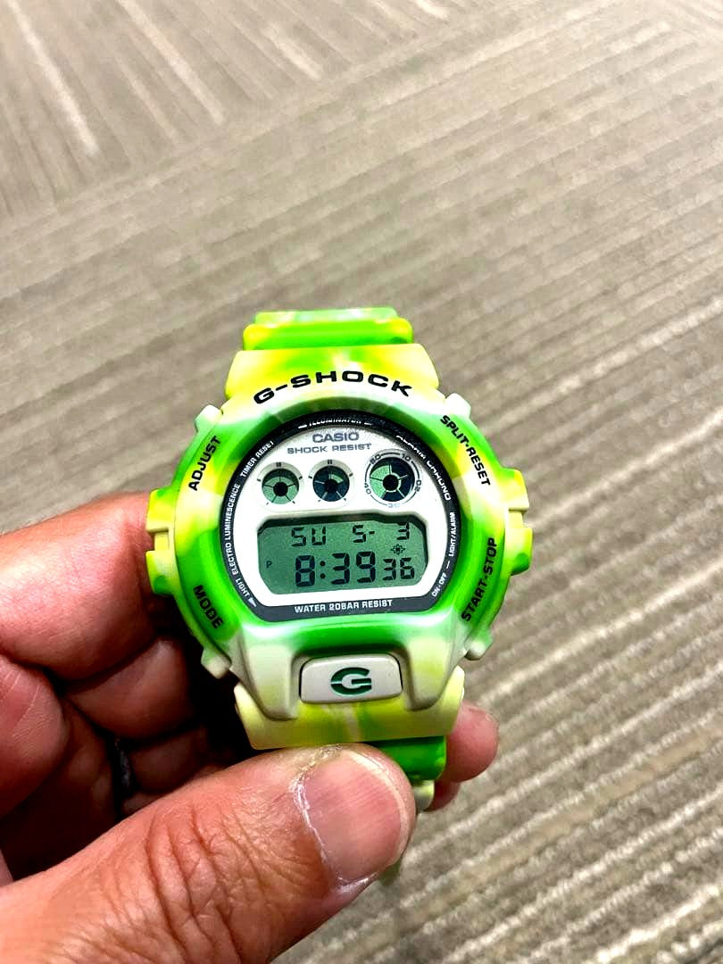 Casio G-Shock DW-6900 digital watch with marble color design and shock resistant features