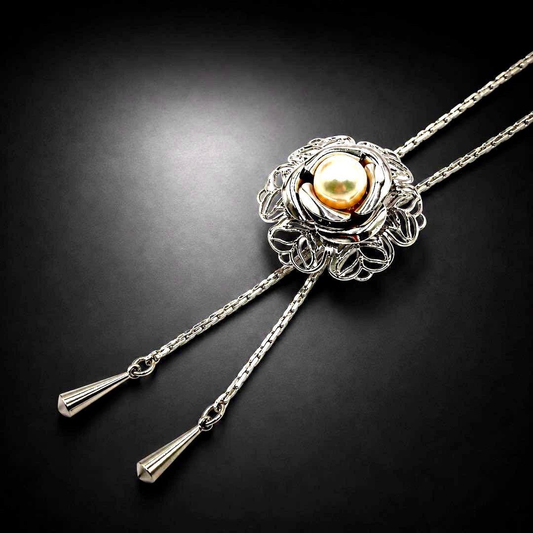 Akoya pearl loop tie necklace with 10mm pearls in silver tone featuring PAT stamp
