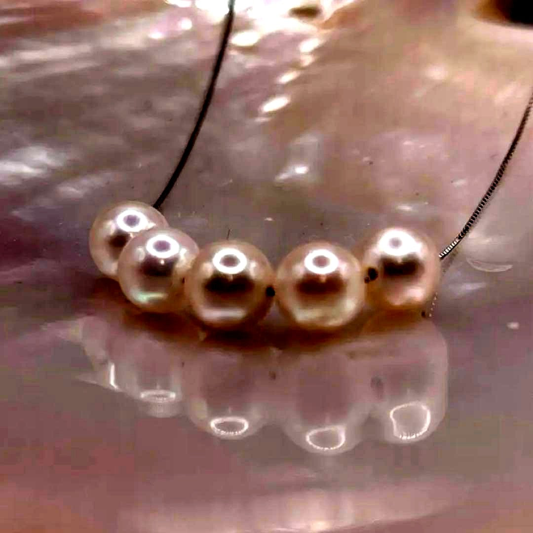 Akoya Pearl 5-row white necklace featuring 7mm pearls and adjustable 42cm S925 rhodium plated chain