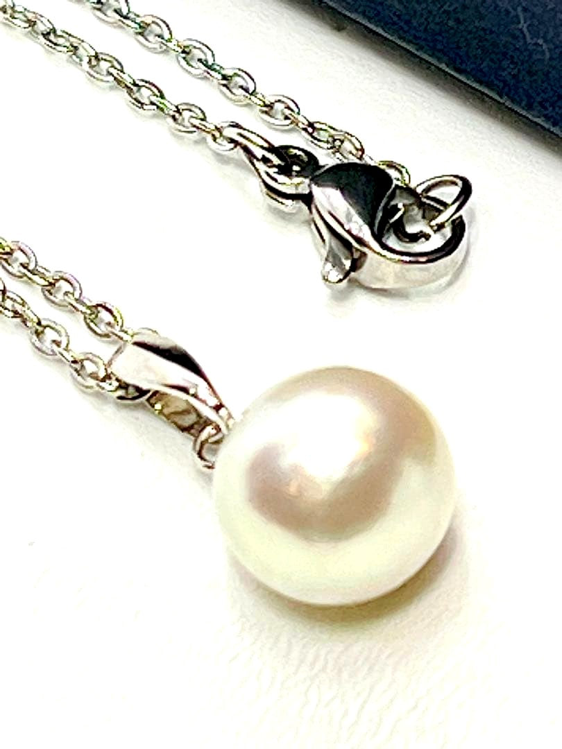 Akoya pearl necklace with 9.8mm large round uncolored pearls and silver stainless steel rhodium chain